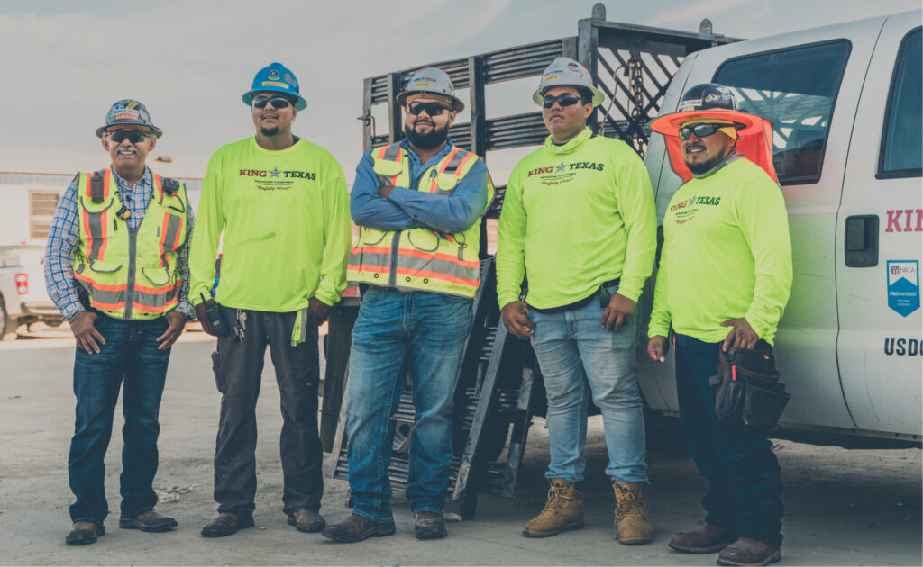 King of Texas commercial roofing contractor field crew at an active industrial roofing job site