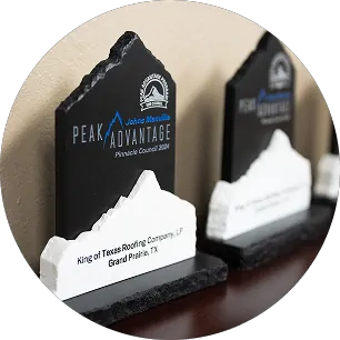 Industry awards representing King of Texas Roofing’s growth into a large-scale commercial contractor during the 1990s